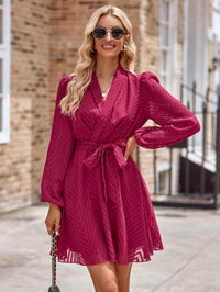 Thumbnail for Belted Surplice Neck Long Sleeve Mini Dress