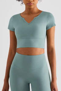 Thumbnail for Notched Neck Short Sleeve Cropped Sports Top
