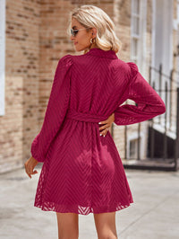 Thumbnail for Belted Surplice Neck Long Sleeve Mini Dress