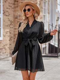 Thumbnail for Belted Surplice Neck Long Sleeve Mini Dress