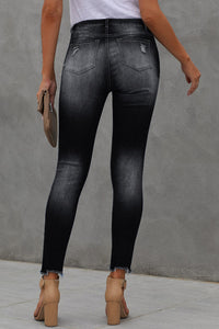 Thumbnail for Button Fly Hem Detail Ankle-Length Skinny Jeans